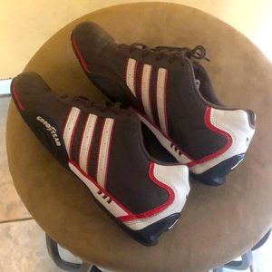 Brown, red, tan and black Adidas sneakers